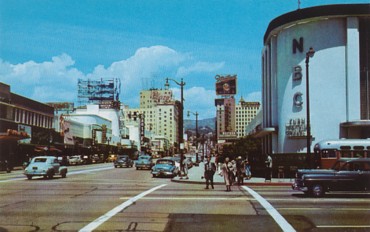 Featured is a postcard image of Sunset and Vine in Hollywood, California, circa 1950s.  The Pacific Headquarters of four (?) of the major broadcasting (soon to be TV) Networks were located at that intersection.  Note the NBC building on the corner.  The original unused postcard is for sale in The unltd.com Store. 